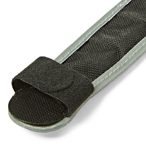 Close-up of a black strap that attaches to collar